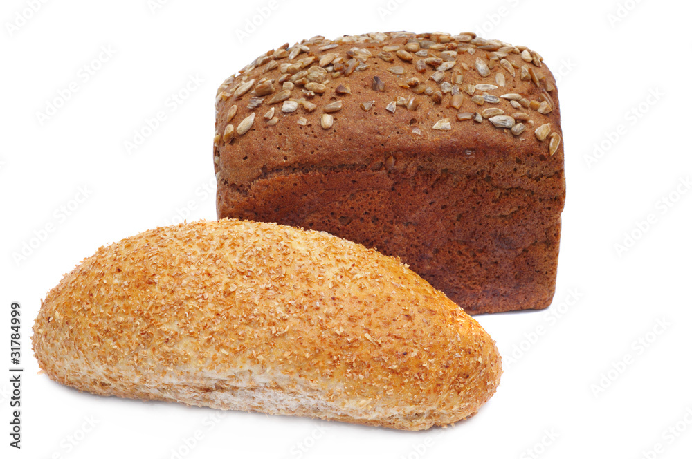 two ruddy loafs of bread with sunflower seeds two ruddy loafs of bread with sunflower seeds