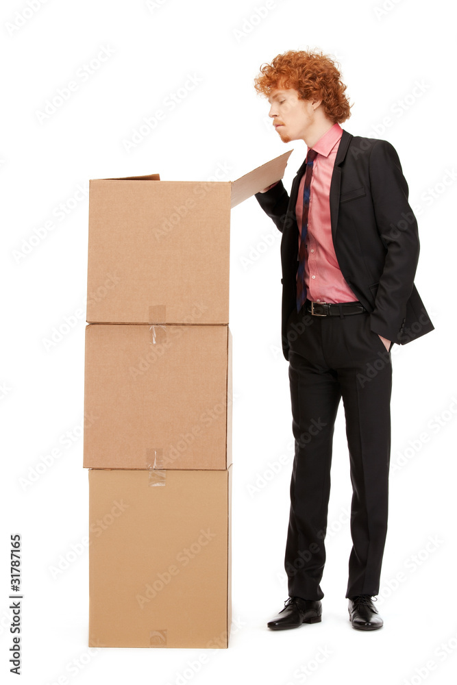 attractive businessman with big boxes attractive businessman with big boxes