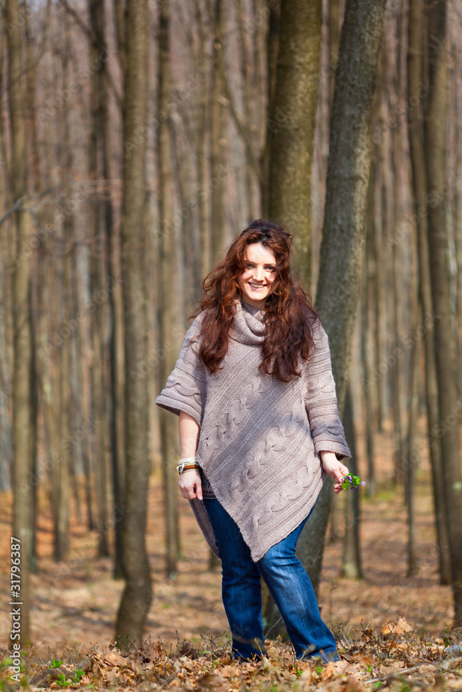 Young woman in a beech forest Young woman in a beech forest