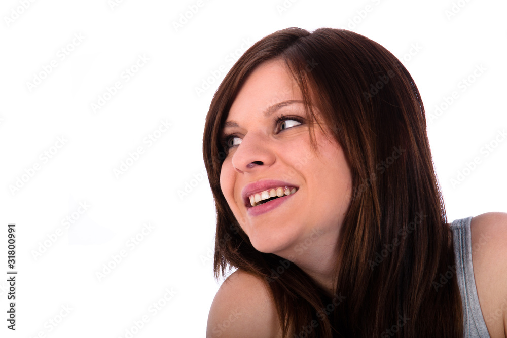 beautiful young woman smiling over the shoulder beautiful young woman smiling over the shoulder