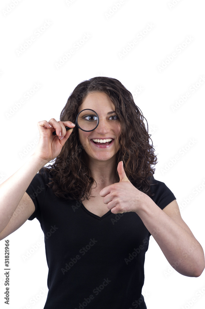 Frau mit Lupe vor dem Gesicht Frau mit Lupe vor dem Gesicht