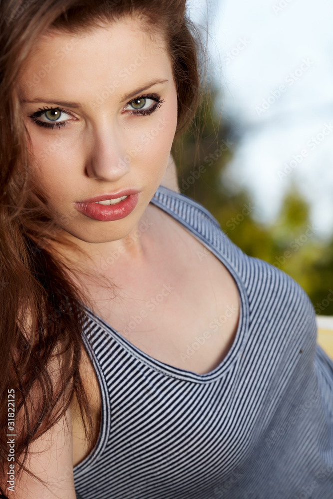 Smiling beautiful woman laying on grass Smiling beautiful woman laying on grass