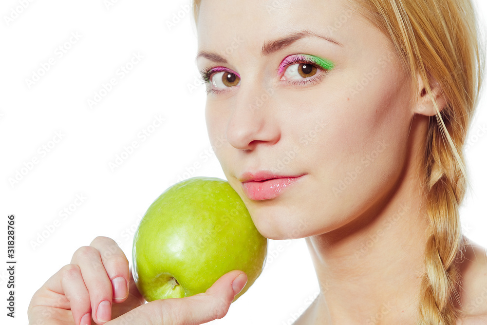 portrait of young woman with green apple isolated on white portrait of young woman with green apple isolated on white