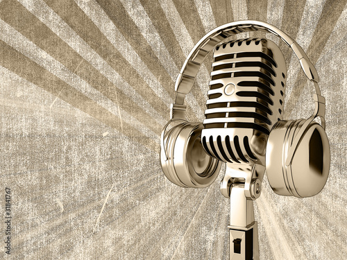 Microphone with headphones on the old background