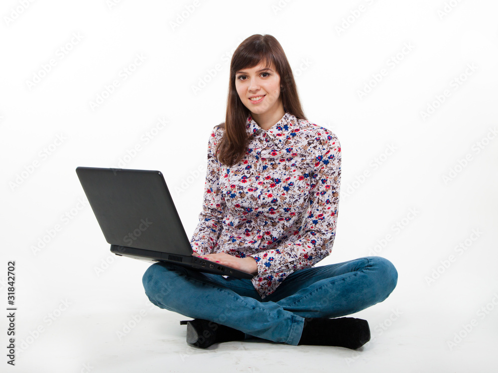 Naklejka premium portrait of girl with laptop isolated on white