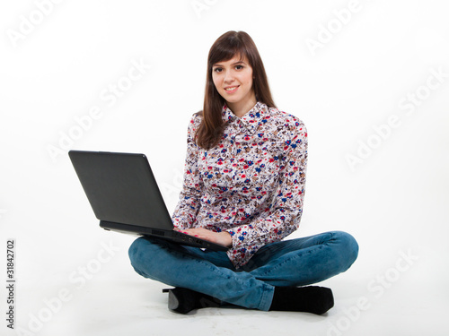 portrait of girl with laptop isolated on white