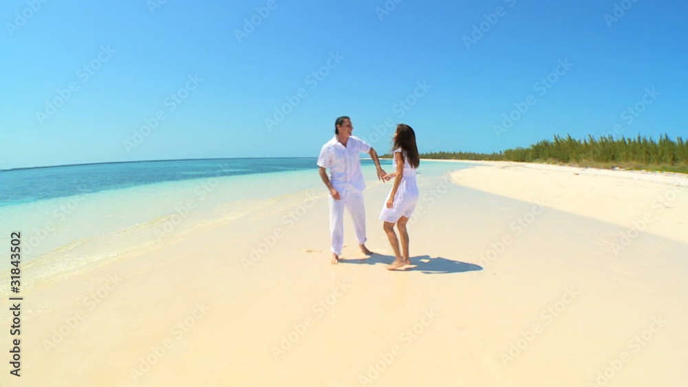 Attractive Couple on Luxury Island Vacation Attractive Couple on Luxury Island Vacation