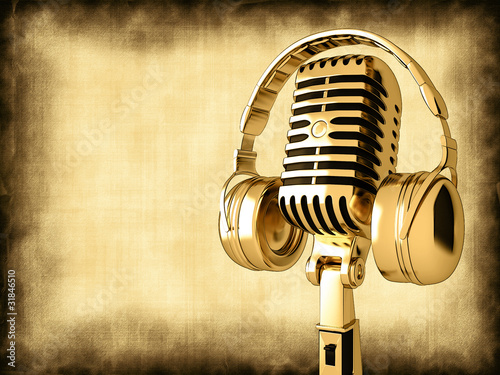 Microphone with headphones on old background