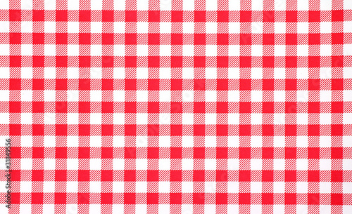 Close view of red checkerboard tablecloth photo