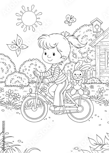 Girl rides a bicycle