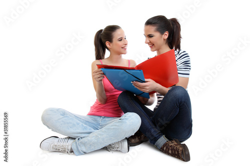 young happy girlfriends learing together