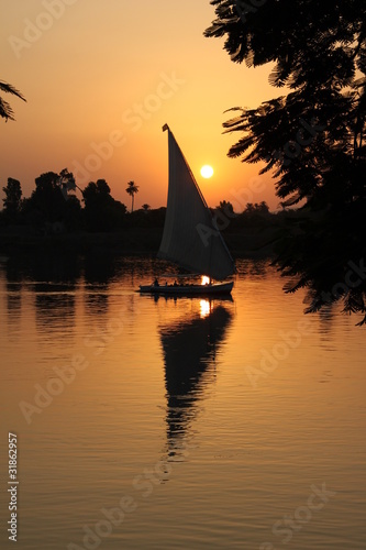 Fotografie Egypt, Sunset over the Nile, with a felucca