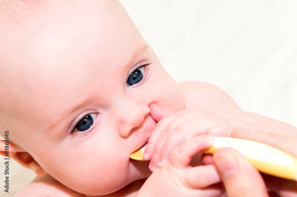 baby with spoon baby with spoon