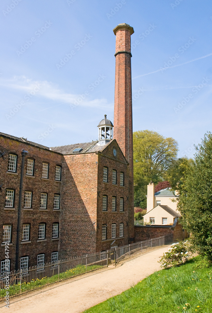 Fototapeta premium Old cotton mill by path