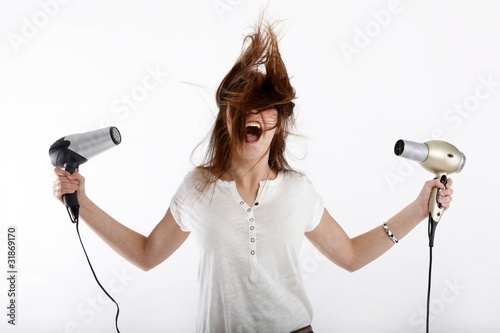 young beauty with two hairdryer