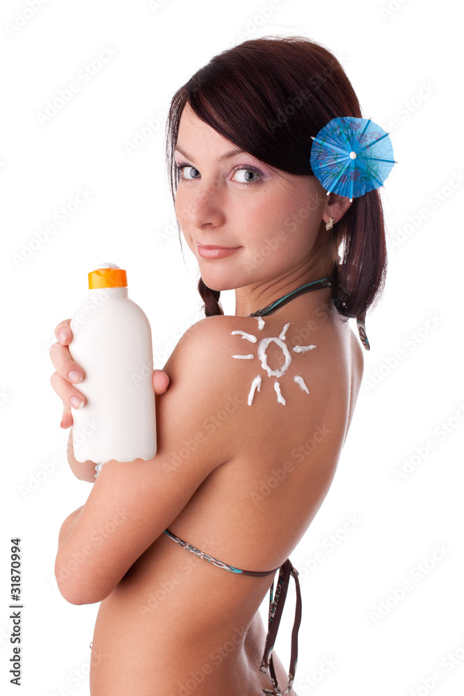 Young woman in bikini with sunscreen. Young woman in bikini with sunscreen.