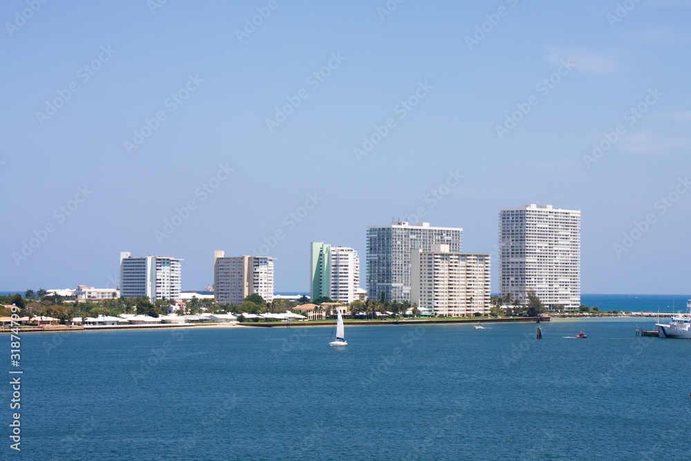 Fototapeta premium Sailboat by White Coastal Condos