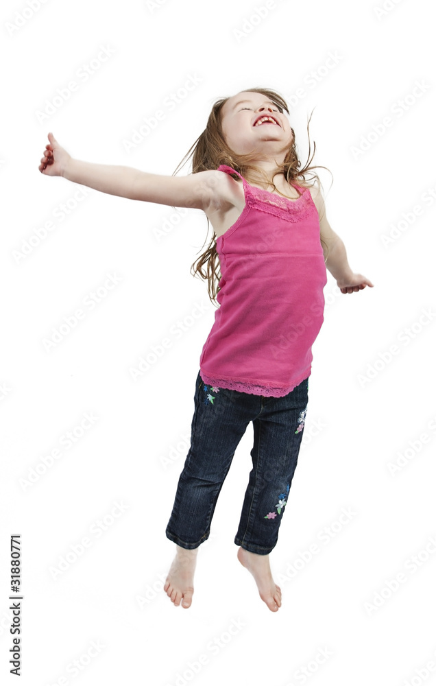 Adorable little girl jumping in air. isolated on white backgrou Adorable little girl jumping in air. isolated on white backgrou