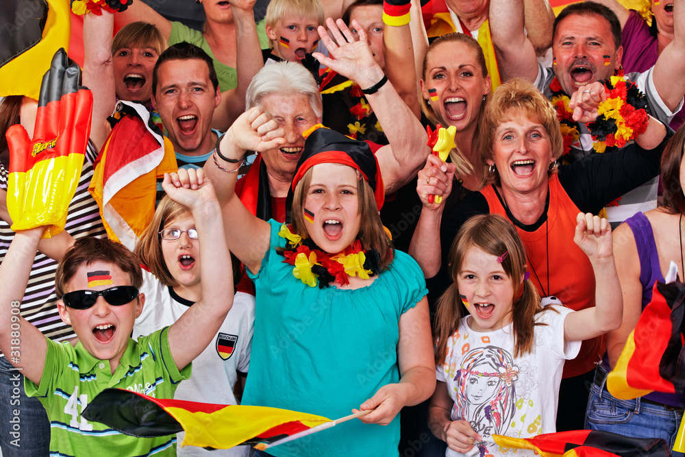 Fototapeta premium young and aged german soccer fans