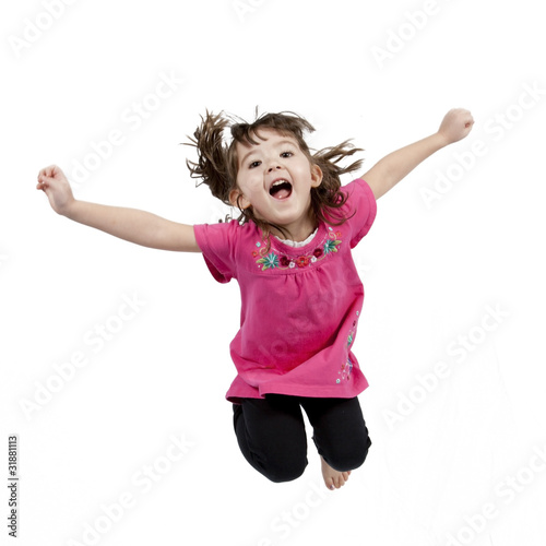 Adorable little girl jumping in air. isolated on white backgrou