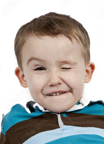 Portrait of a cute little boy. Isolated on white background