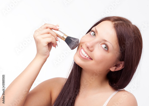 woman applying powder