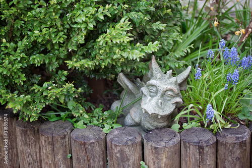 figure of a dragon in the green grass