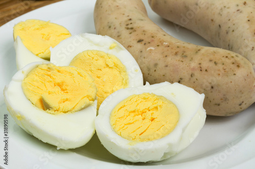 Fototapeta Naklejka Na Ścianę i Meble -  Eggs and white sausages for Easter breakfast