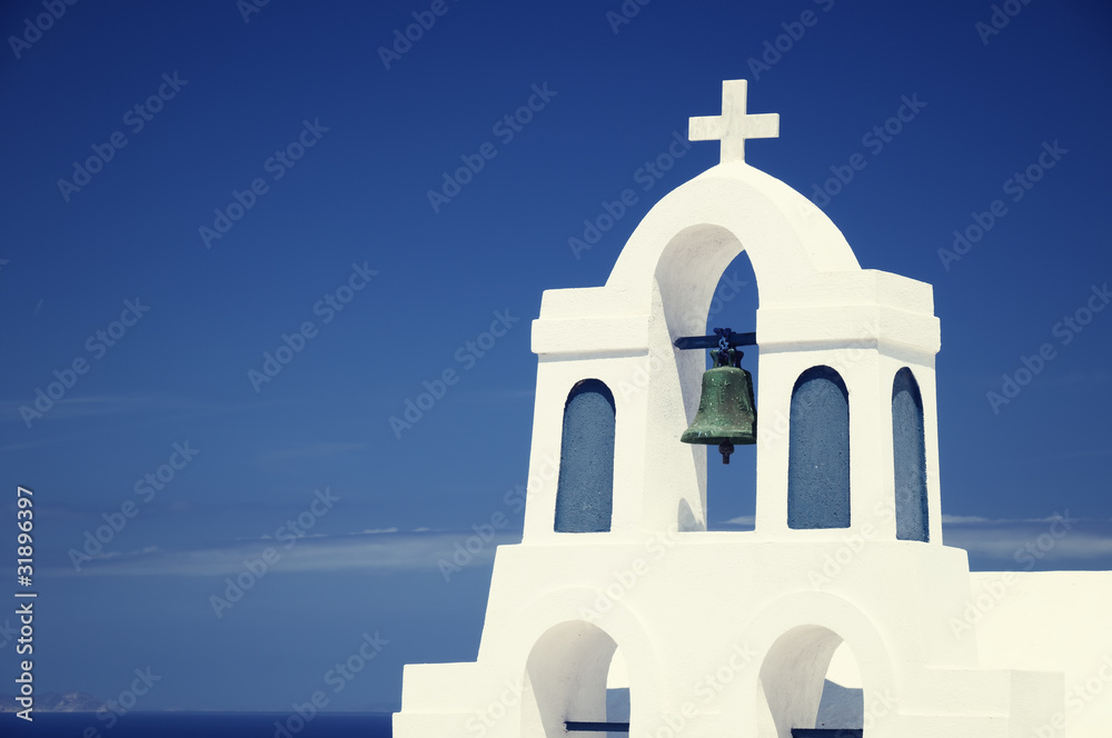 Orthodox church bett at  Oia (Ia) village on Santorini island.