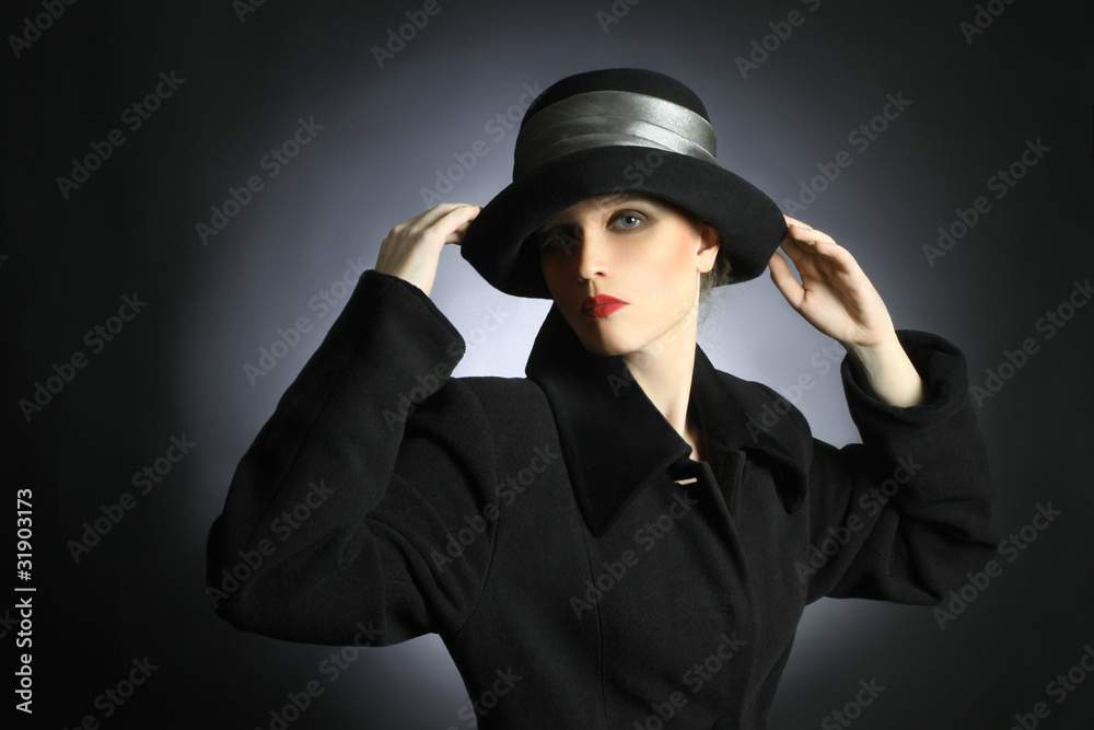 Elegant woman in black hat and coat. Elegant woman in black hat and coat.