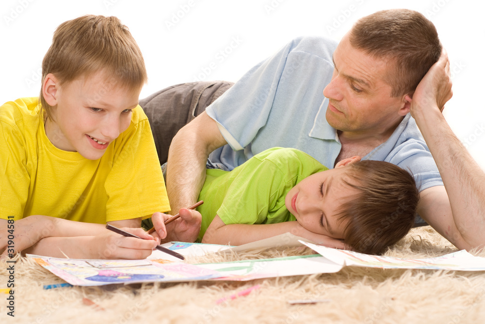 father and two young brothers father and two young brothers