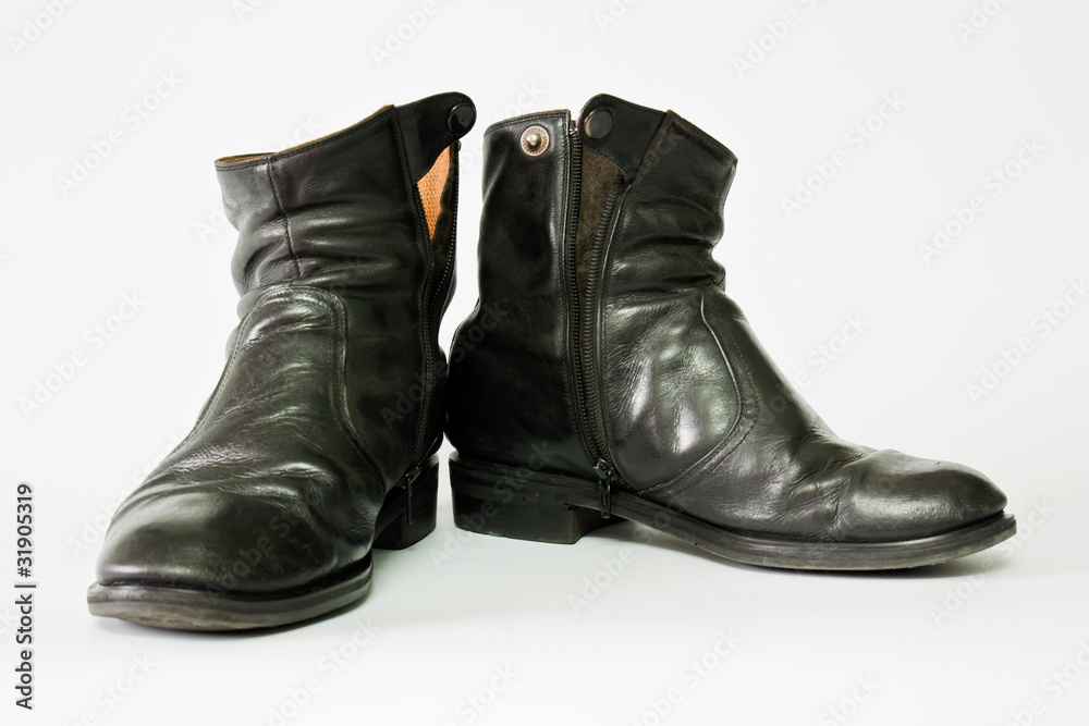 Old black leather boots