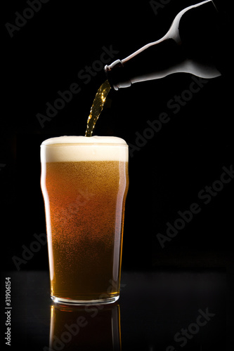 Beer being poured into glass