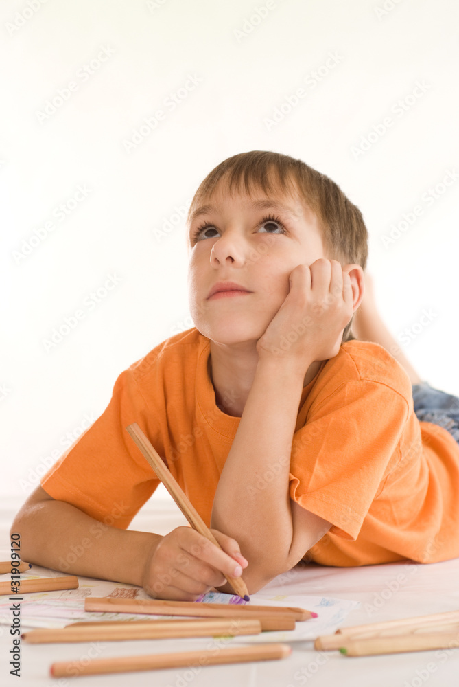 boy lying on the floor boy lying on the floor