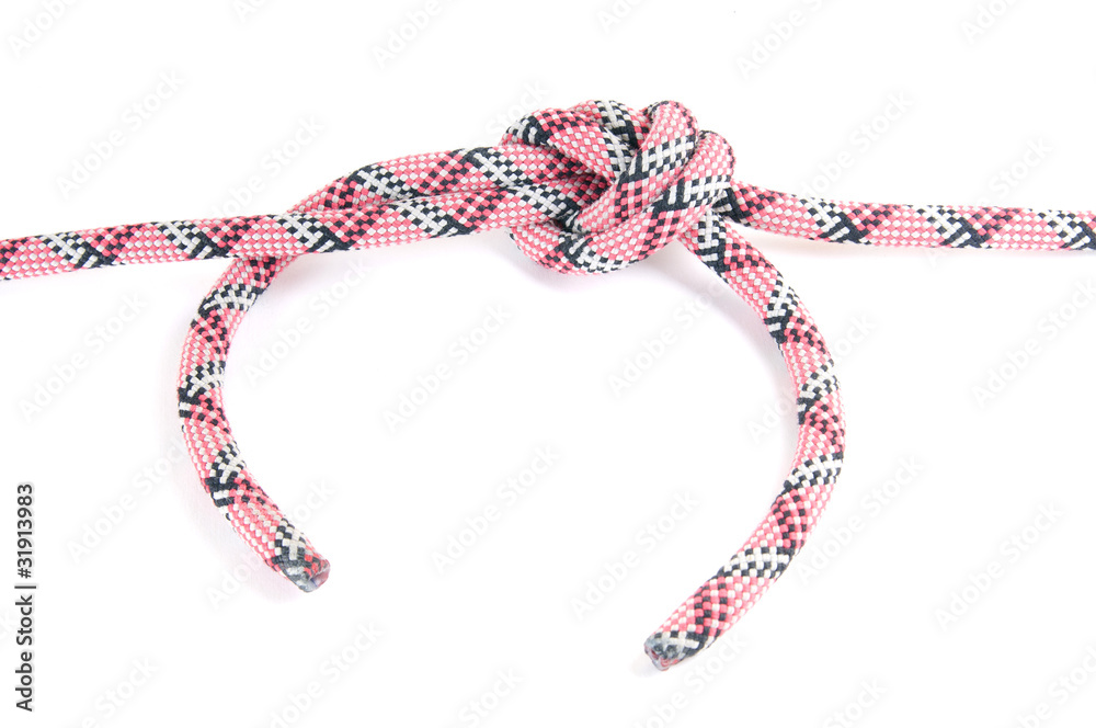Red-white-black alpinist rope with different types of nodes.