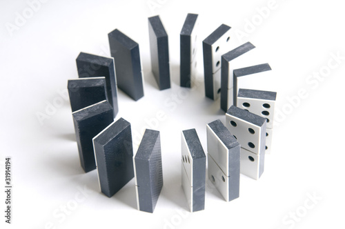Pieces of domino n a circle. Columns from domino