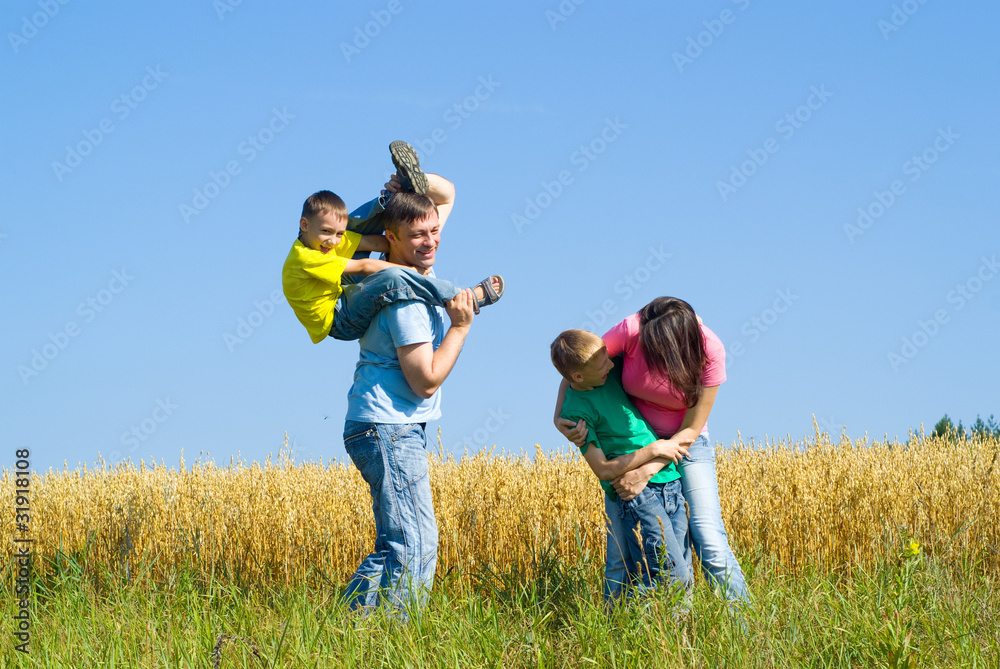 happy famaly plaing at the nature happy famaly plaing at the nature