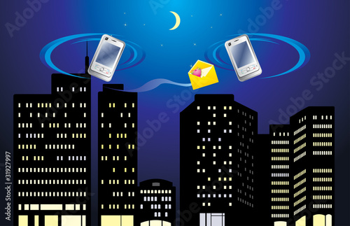 Two mobile telephones on the background of night city
