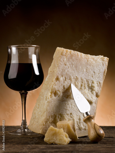 parmesan cheese and glass of red wine