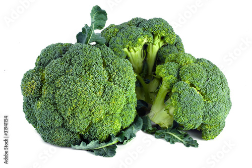 fresh raw broccoli isolated on white background