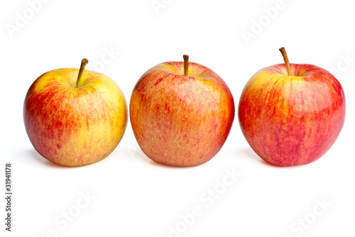 three Royal Gala apples