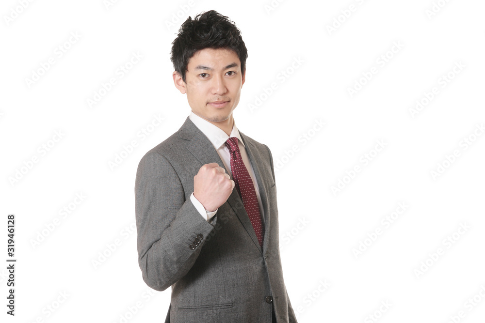 ガッツポーズをするスーツの男性 Stock Photo Adobe Stock