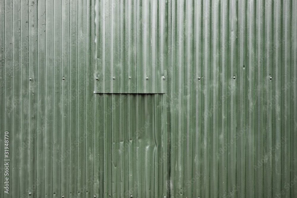 Battered corrugated metal panel Battered corrugated metal panel