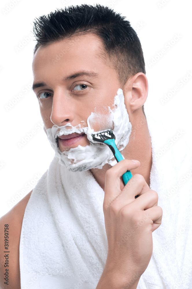 Portrait of man that shaving with foam