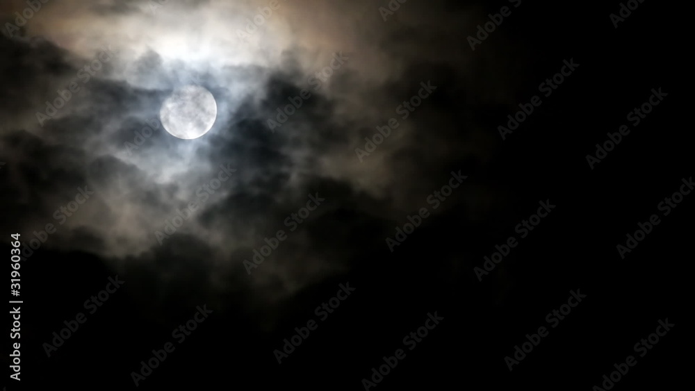 Moving Clouds at Night Across the Full Moon Moving Clouds at Night Across the Full Moon