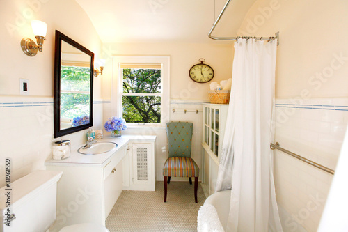 Antique bathroom with white curtain and fresh view