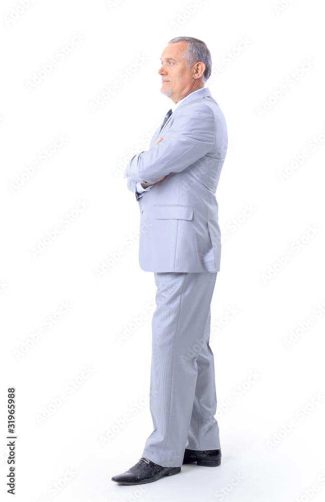 Full length profile of a middle aged business man Full length profile of a middle aged business man