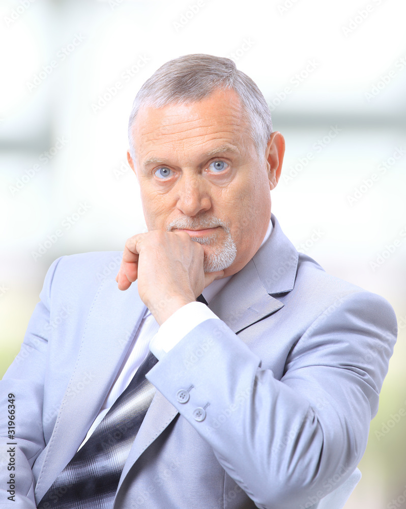 Successful business man smiling over lihgt background Successful business man smiling over lihgt background