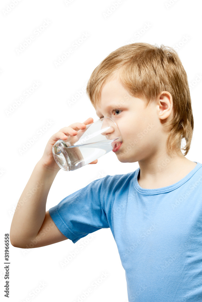 Little boy drink cold water from the glass. Little boy drink cold water from the glass.
