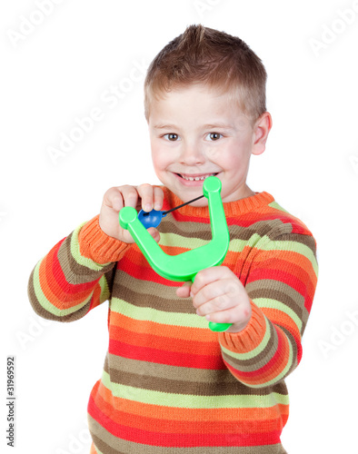 Vászonkép Adorable child with a slingshot